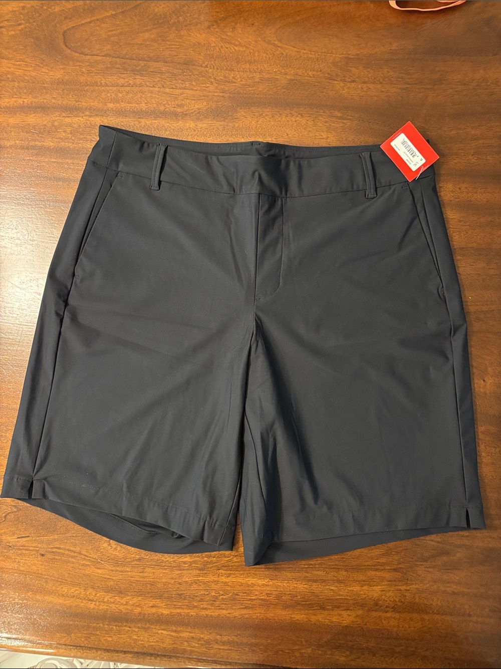 SPANX Women’s Black Flat-Front 10” Sunshine Shorts